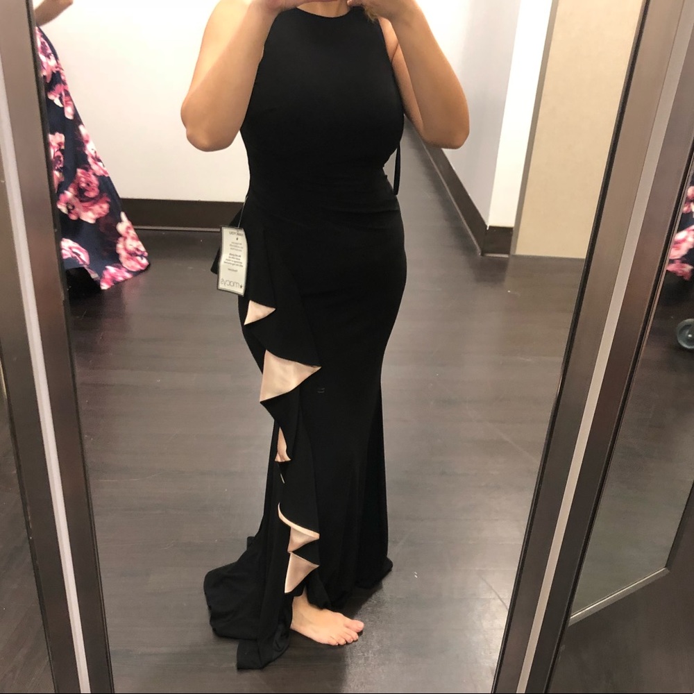 Stunning black dress with rose gold ruffles!